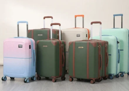 Modern rolling suitcase and luggage sets in various colors displayed together for travel.