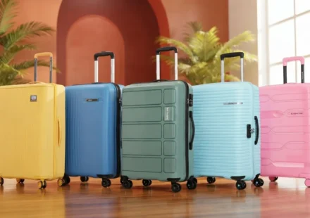 Collection of modern travel luggage suitcases in various vibrant colors
